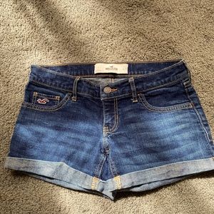 Low rise, dark blue hollister jean shorts.